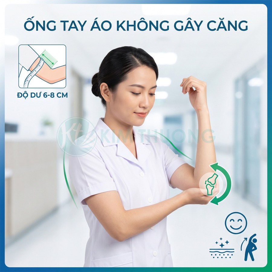 Nữ nhân viên y tế mặc áo blouse trắng tay ngắn, ống tay rộng thoải mái không gây căng khi cử động