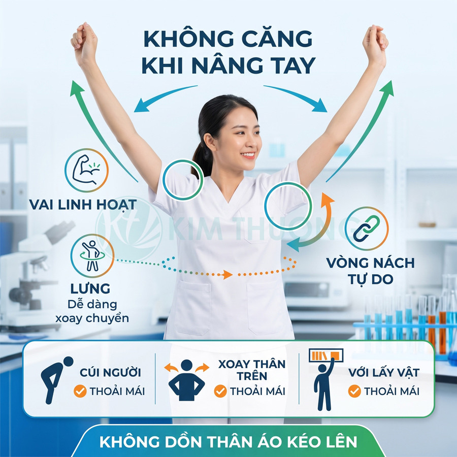 Nữ nhân viên y tế mặc áo blouse trắng giơ tay cao, minh họa áo đồng phục co giãn thoải mái khi vận động